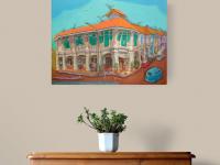 Original painting of Blair Road Corner displayed in a homely room with warm theme