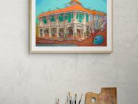 Blair Road conservation shophouse art shown as framed in a rustic desk setting