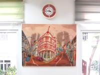 HweeYen Ong painting of Chinatown Corner in her Joo Chiat art studio