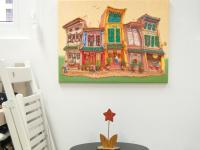 HweeYen Ong painting Spottiswoode Park Shophouses in her Joo Chiat art studio