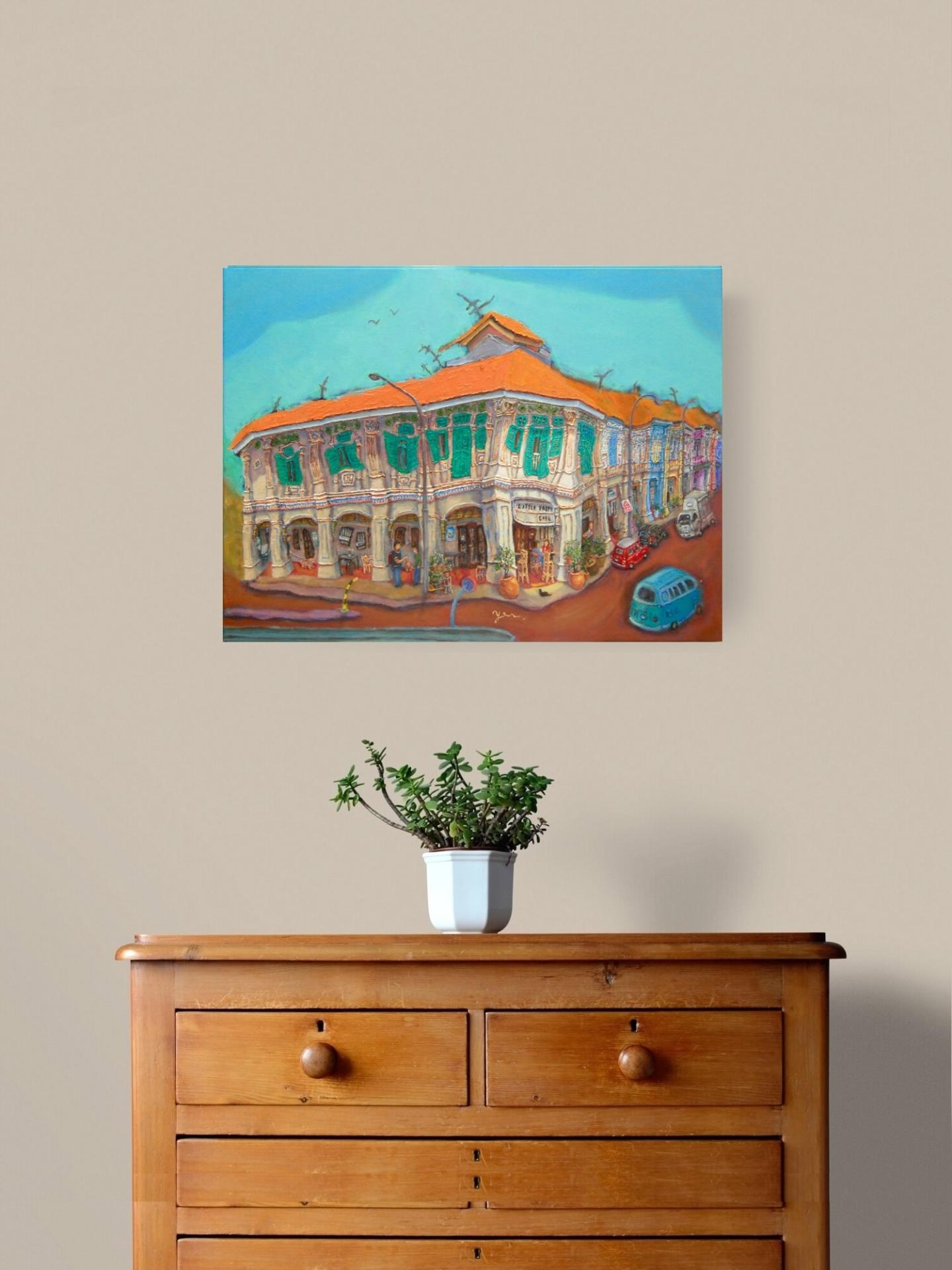 Original painting of Blair Road Corner displayed in a homely room with warm theme