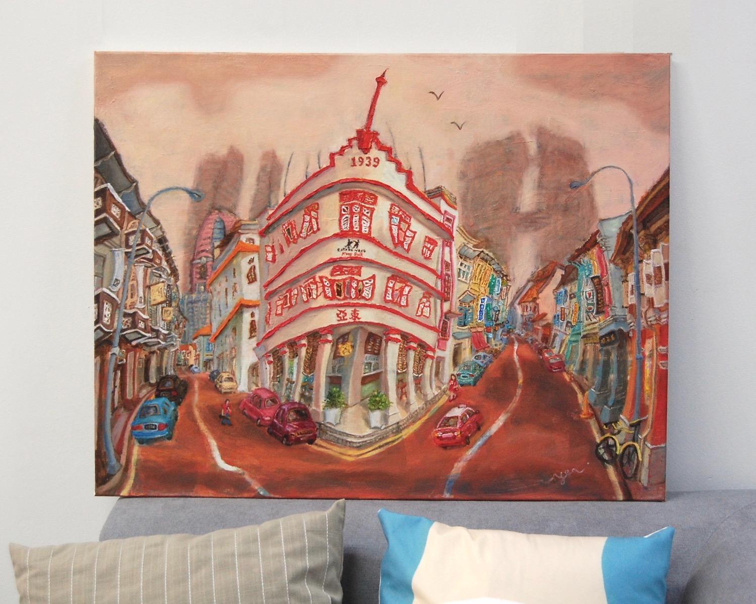 Original Singapore heritage painting Chinatown Corner on a sofa for size reference
