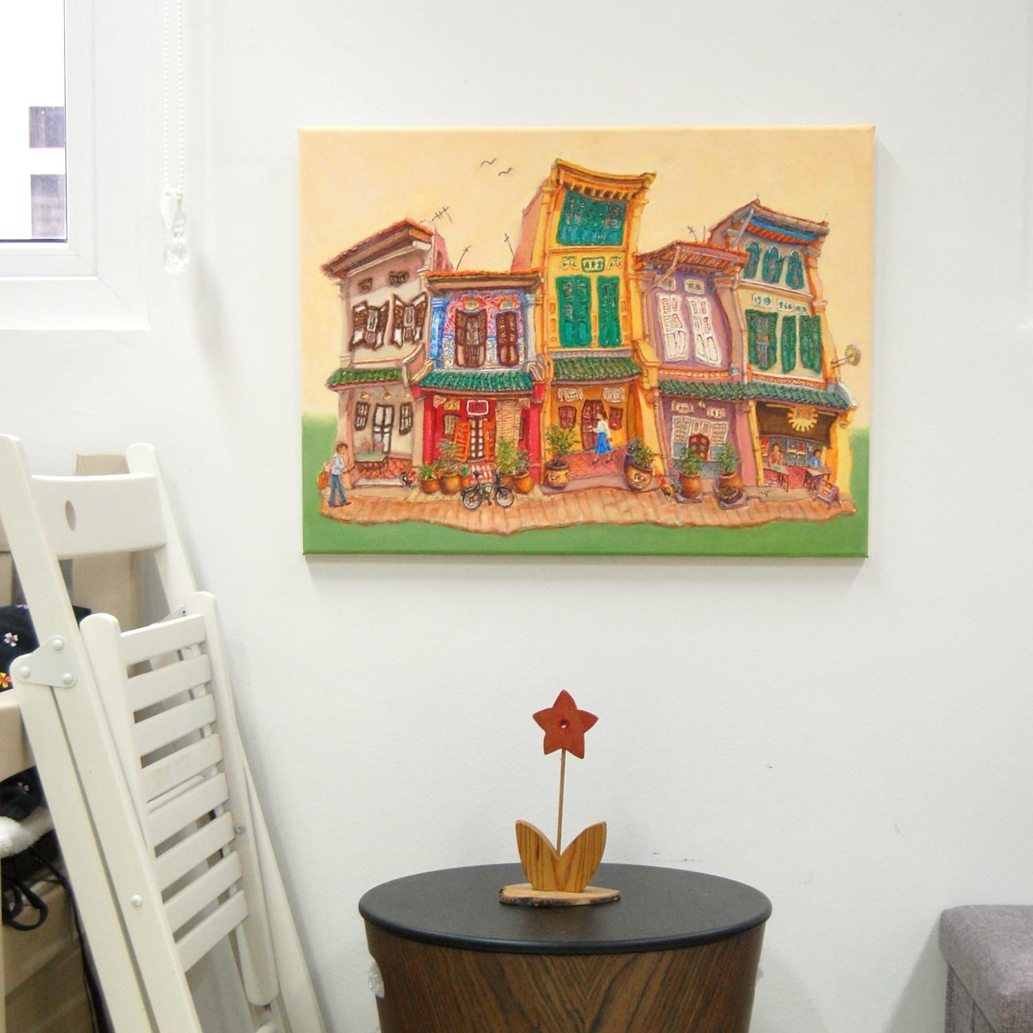 HweeYen Ong painting Spottiswoode Park Shophouses in her Joo Chiat art studio